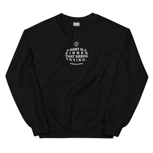 "A Saint Is A Sinner The Keeps Trying" - Unisex Sweatshirt